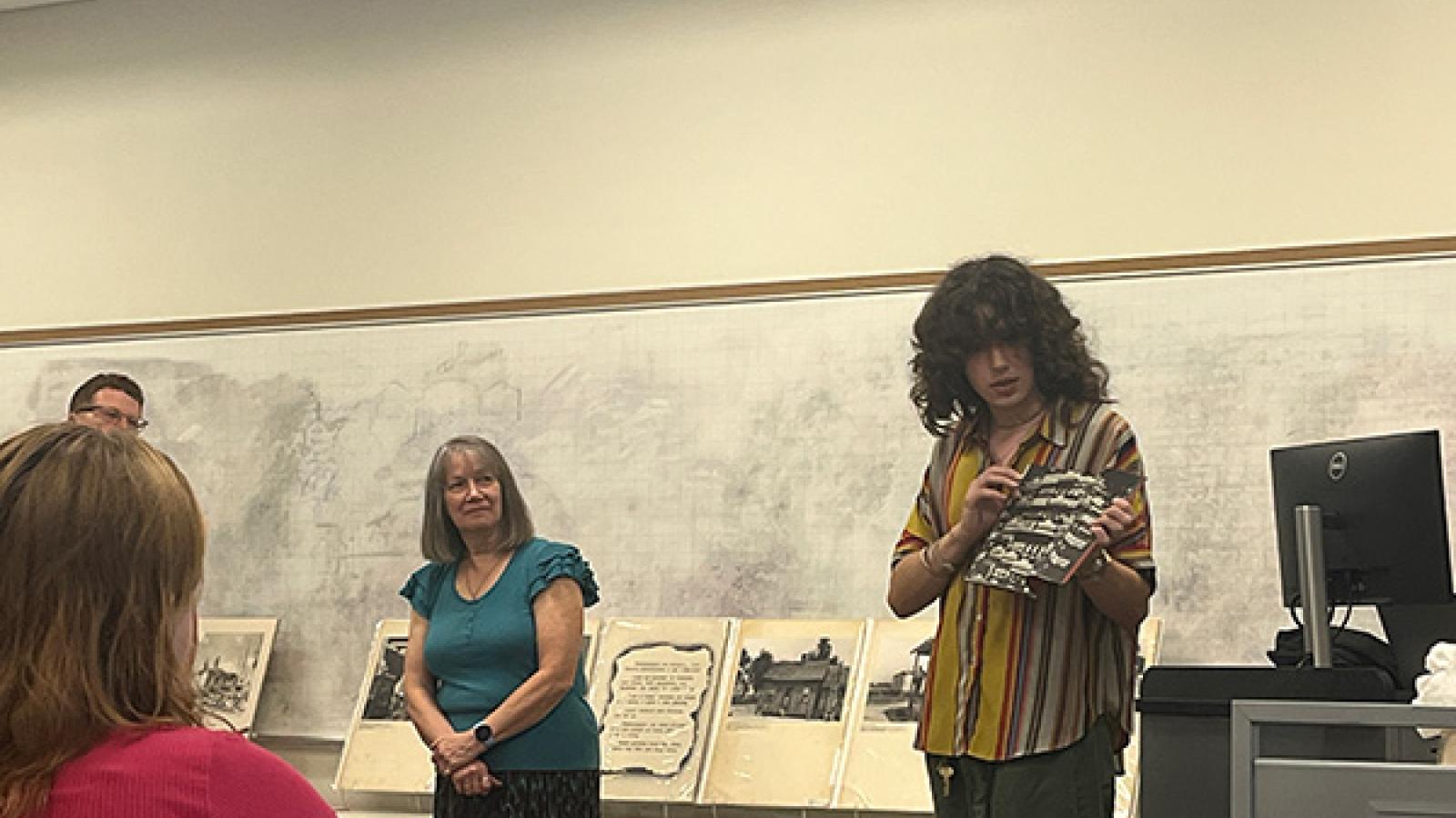 Works from the Thompson Library Special Collections being presented to students. 