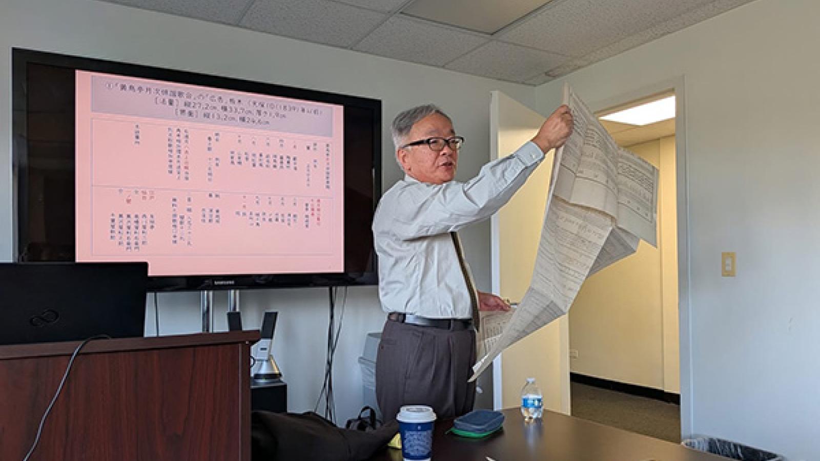 Professor Emeritus Takahashi Akinori of the Graduate School of Arts and Letters at Tohoku University presenting at the workshop. 