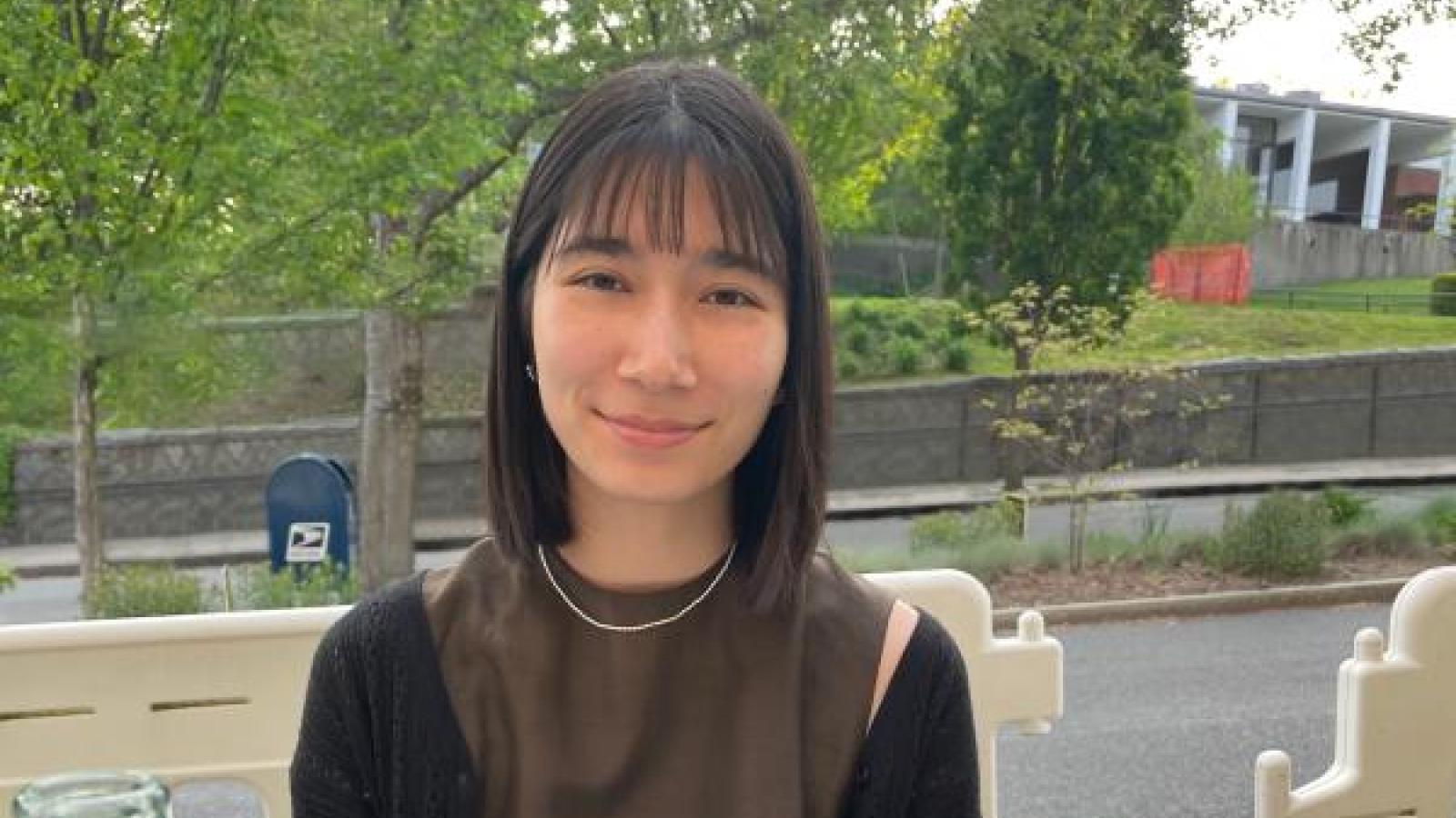 Michiko sitting at a restaurant