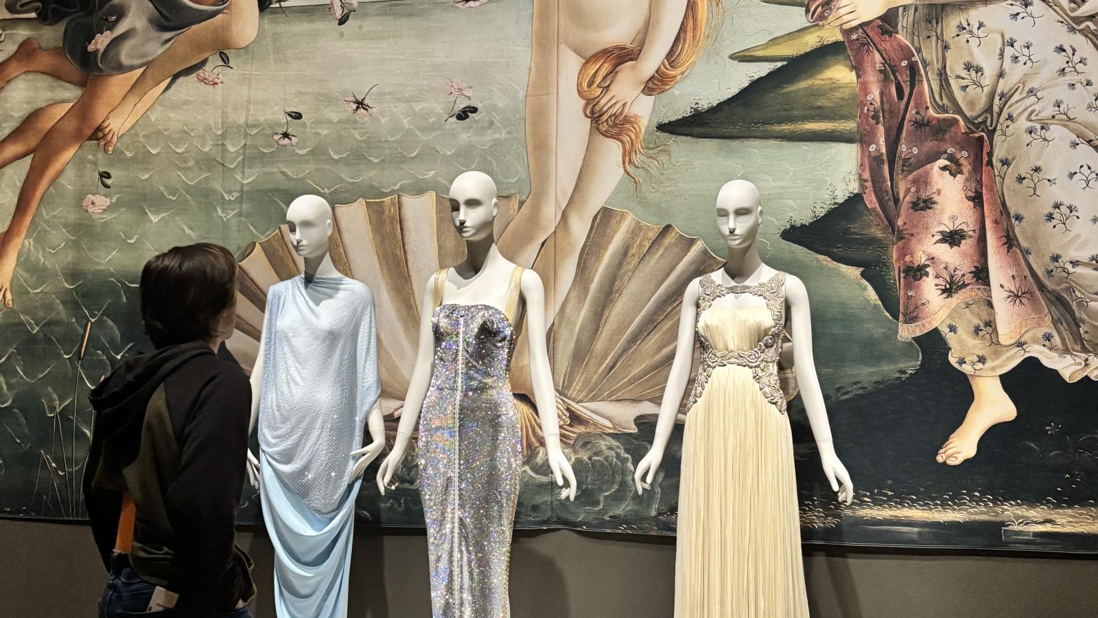 Student observes a display. 