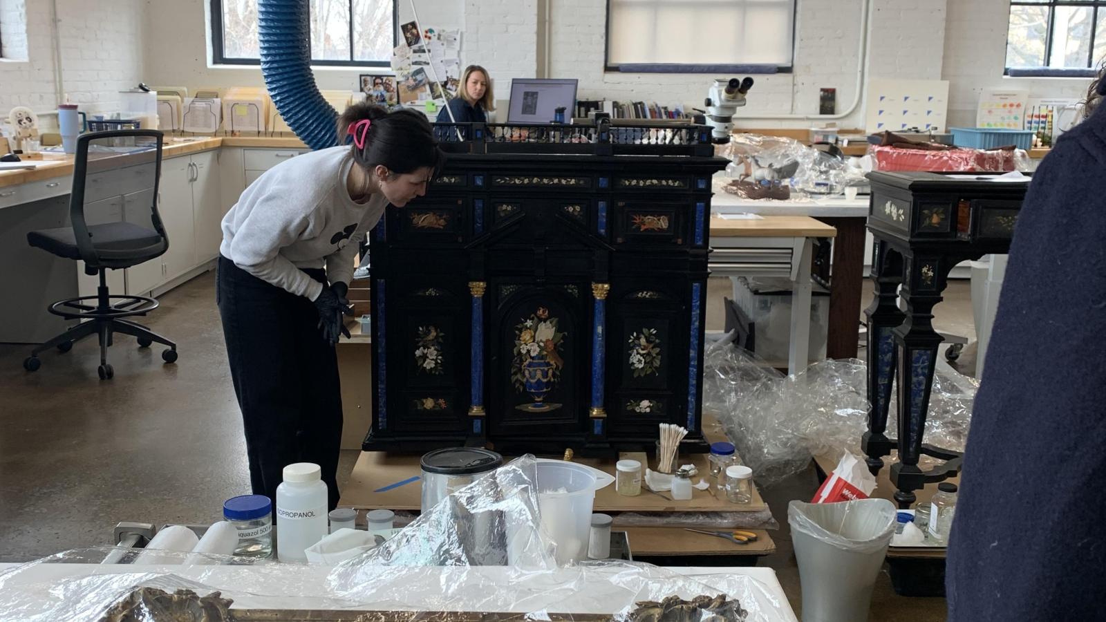 student working on model