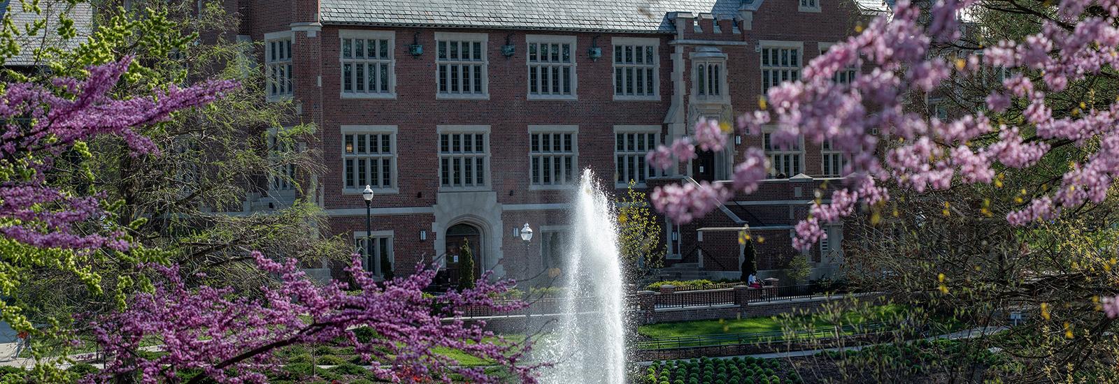 Pomerene Hall, home of the History of Art Department, seen on a spring day with Mirror Lake in the foreground