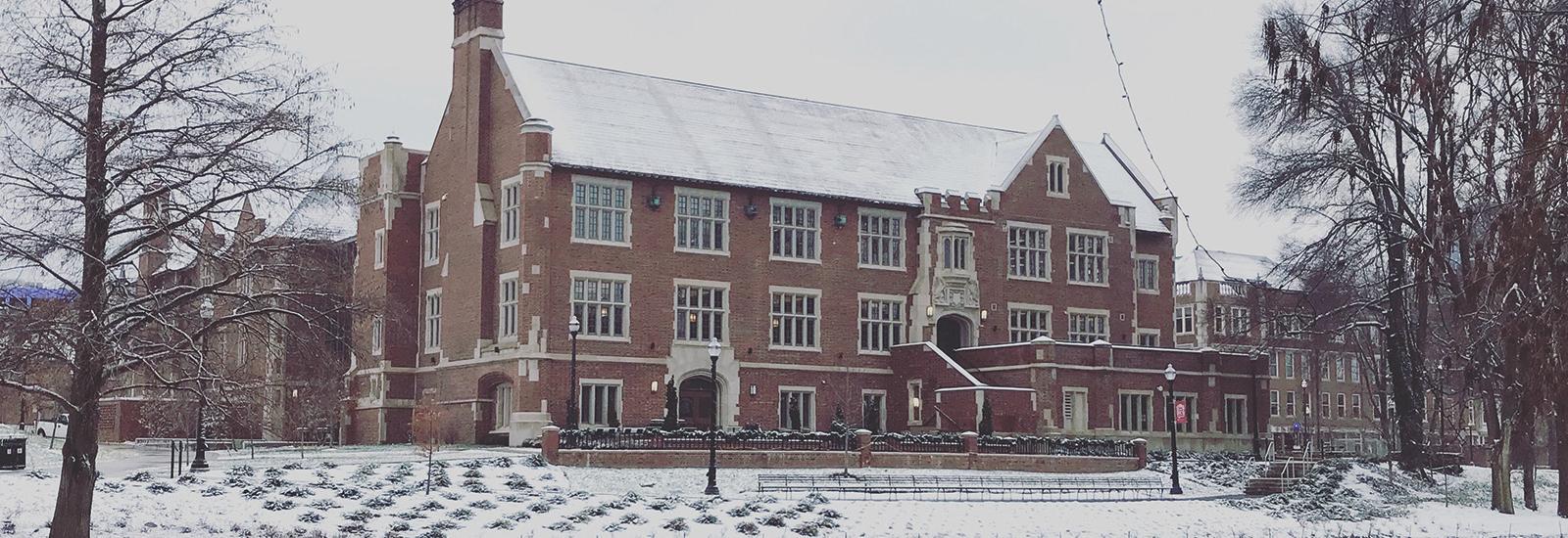 Pomerene Hall, home of the History of Art Department, viewed on a winter's day with Mirror Lake in the foreground